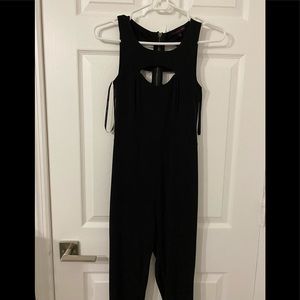 Black form fitting jumpsuit